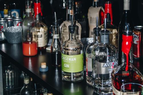Bottles of alcohol lined up on bar, alcohol awareness month 