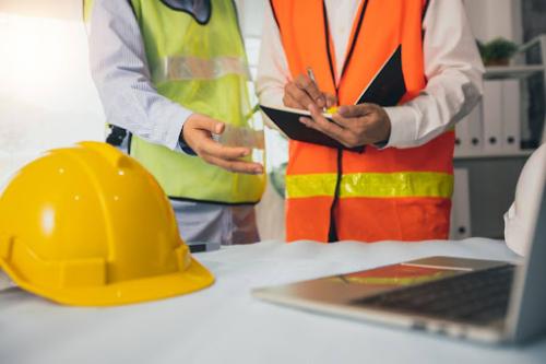 two construction workers write down notes mobile medical corporation what is an osha recordable