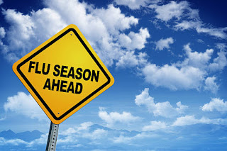 flu season yellow sign